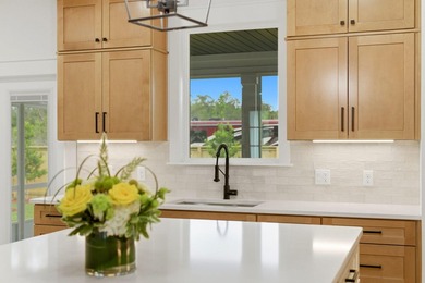 This remarkable new construction home by Carr Custom Homes is - photo 49