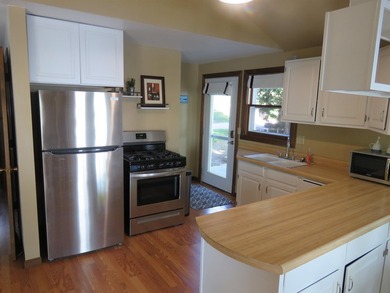 Just listed. Raised Ranch with 50 feet of prime shoreline along - photo 3