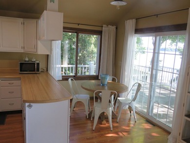Just listed. Raised Ranch with 50 feet of prime shoreline along - photo 4