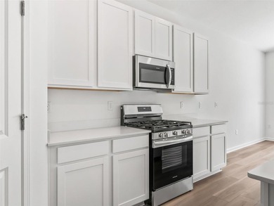 Virtually Staged. Nestled within the gated golf community of - photo 22