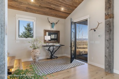 Completely reimagined in 2024, this iconic Teton Valley home has - photo 2