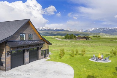 Completely reimagined in 2024, this iconic Teton Valley home has - photo 9