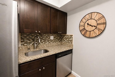 Experience resort-style living in this beautifully updated - photo 8