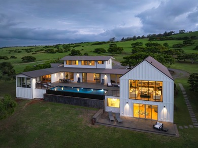 A rare 20-acre offering near Hawi, this fully remodeled modern - photo 1