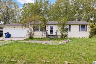With a little TLC this home would be a real charmer. Priced - Lake Home For Sale in Cadiz, Kentucky