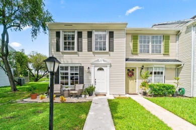 Lake Townhome/Townhouse For Sale in Jupiter, Florida