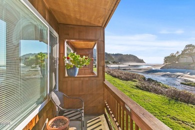 Step into coastal living at its finest with this inviting first