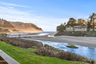 Step into coastal living at its finest with this inviting first