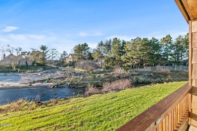 Step into coastal living at its finest with this inviting first