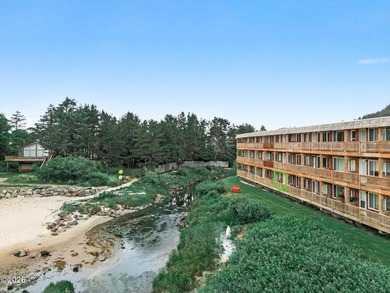 Step into coastal living at its finest with this inviting first