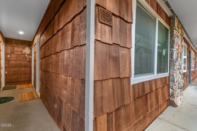 Step into coastal living at its finest with this inviting first