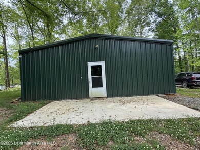 Nestled in a private, wooded setting, this property offers a - photo 1