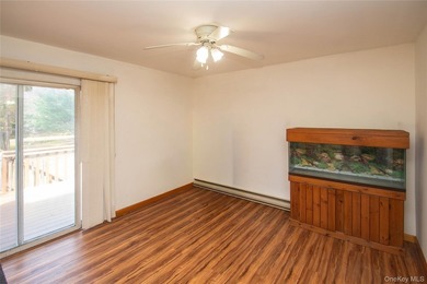 Tucked away on a nice corner lot in a quiet area of Forestburgh - photo 9