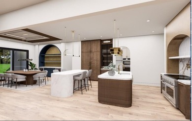 Welcome to 215 Traditions Drive, an exceptional custom luxury