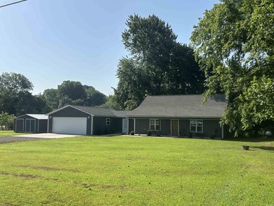 WOW! If you love fishing and riverfront living, this home is for - photo 2