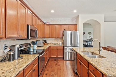 Nestled within the prestigious gated community of Rialto, this - photo 5