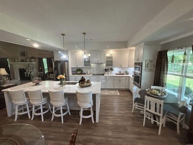 WOW! If you love fishing and riverfront living, this home is for - photo 6
