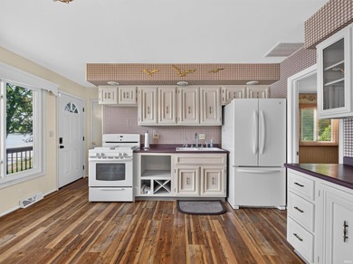 Well-maintained home with LAKE frontage! Open family room and - photo 8