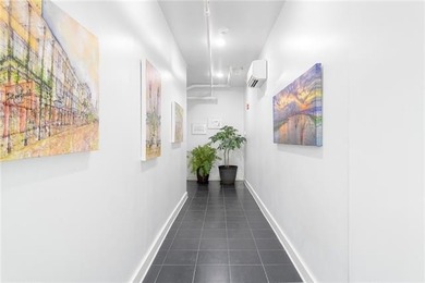 Direct French Quarter Gateway: Rare 3-Bedroom Loft Overlooking