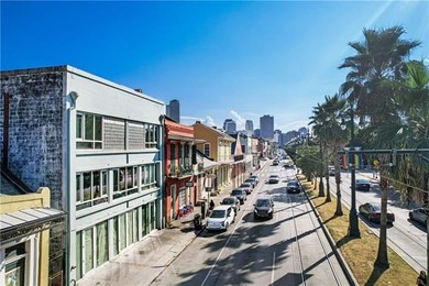 Direct French Quarter Gateway: Rare 3-Bedroom Loft Overlooking