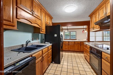 4BR/3BA home situated on a spacious 0.54-acre lot in the - photo 22