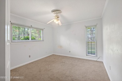 4BR/3BA home situated on a spacious 0.54-acre lot in the - photo 32