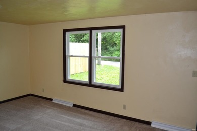 Recently remodeled and move-in ready! This charming brick - photo 3