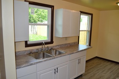 Recently remodeled and move-in ready! This charming brick - photo 9