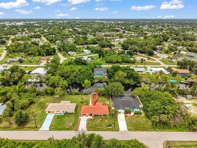 Enjoy Florida WATERFRONT LIVING in this beautifully REMODELED - photo 1