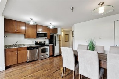 LOCATION - COURTYARD VIEW - TWO BATHS - LOVELY, FLEXIBLE FLOOR