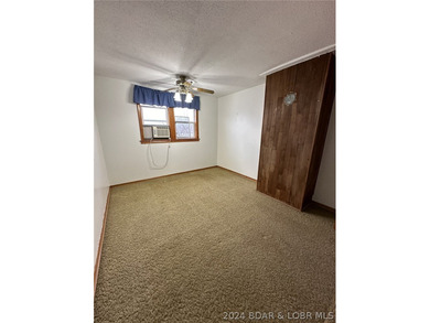 4-bed, 2-bath waterfront home in the Turkey Creek arm of Lake of - photo 18