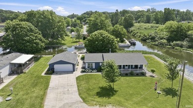 Discover turnkey lake living on Kuhn Lake, part of the - photo 4