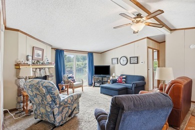 Discover turnkey lake living on Kuhn Lake, part of the - photo 10