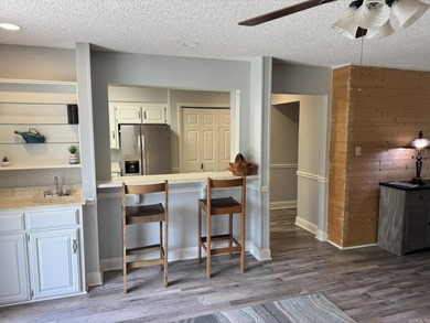 Enjoy the privacy of this upper-level condo with no steps - photo 6