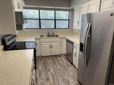 Enjoy the privacy of this upper-level condo with no steps - photo 8