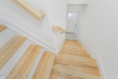 Brand-new 6 over 6 two-family home located in the desirable - photo 15