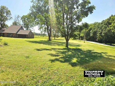 Rustic lodge-style living meets country convenience in this - photo 17