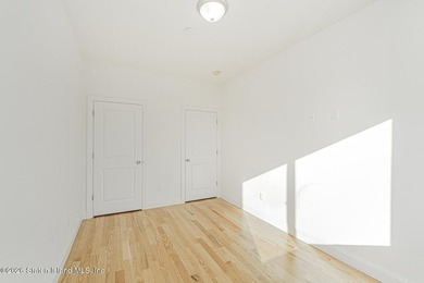 Brand-new 6 over 6 two-family home located in the desirable - photo 17