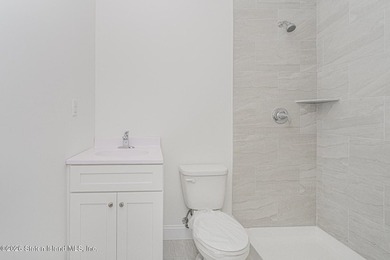 Brand-new 6 over 6 two-family home located in the desirable - photo 19