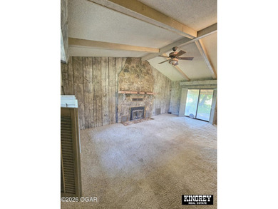 Rustic lodge-style living meets country convenience in this - photo 23