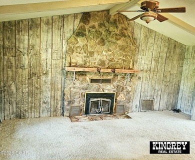 Rustic lodge-style living meets country convenience in this - photo 25