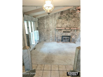 Rustic lodge-style living meets country convenience in this - photo 27