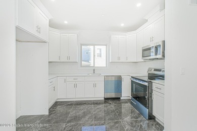 Brand-new 6 over 6 two-family home located in the desirable - photo 28