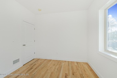 Brand-new 6 over 6 two-family home located in the desirable - photo 33