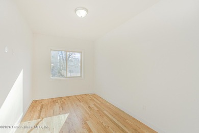 Brand-new 6 over 6 two-family home located in the desirable - photo 34