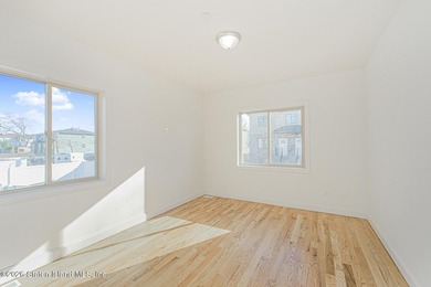 Brand-new 6 over 6 two-family home located in the desirable - photo 36