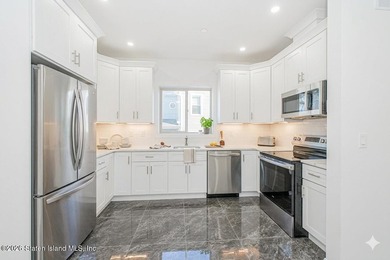 Brand-new 6 over 6 two-family home located in the desirable - photo 45