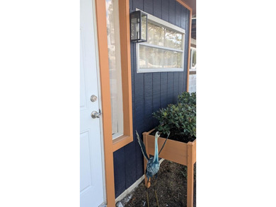 Escape to this beautifully renovated coastal getaway, offered - photo 4