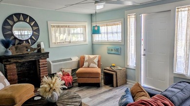 Escape to this beautifully renovated coastal getaway, offered - photo 5