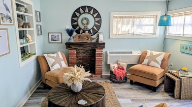 Escape to this beautifully renovated coastal getaway, offered - photo 6